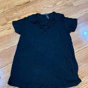 Black top with criss-cross detail on front (size small)